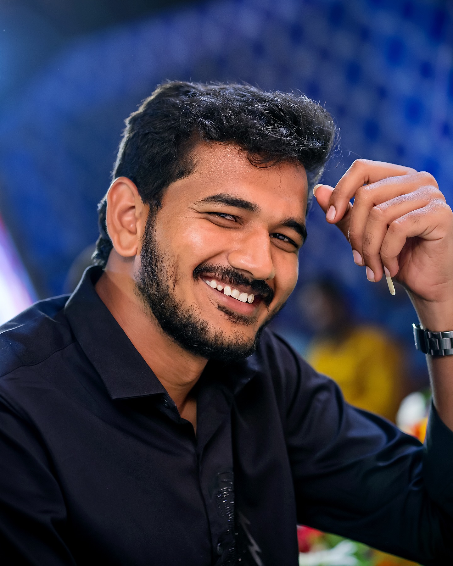 Joyful candid portrait of a smiling man by NAG Photography